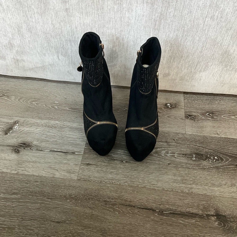 bebe Black Ankle Booties with Gold Accents